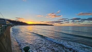 On the beach, white sand