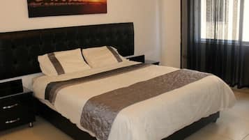 Desk, soundproofing, iron/ironing board, free cribs/infant beds