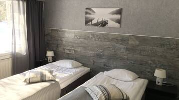Habitación con 2 camas individuales | Cunas gratuitas, wifi gratis y ropa de cama