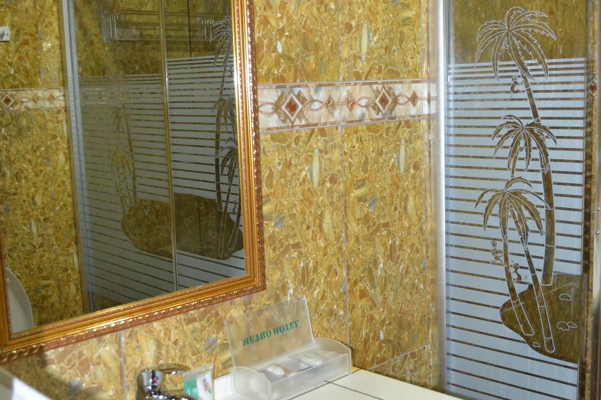 shower, free toiletries, slippers, towels