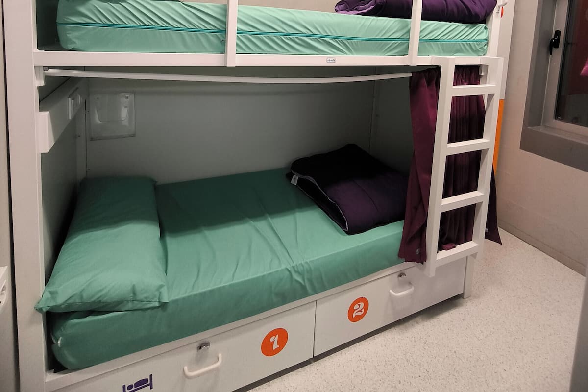 Hypo-allergenic bedding, blackout curtains, iron/ironing board