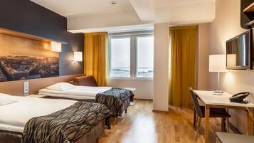 Standard Room (Family Three) | Minibar, in-room safe, desk, iron/ironing board