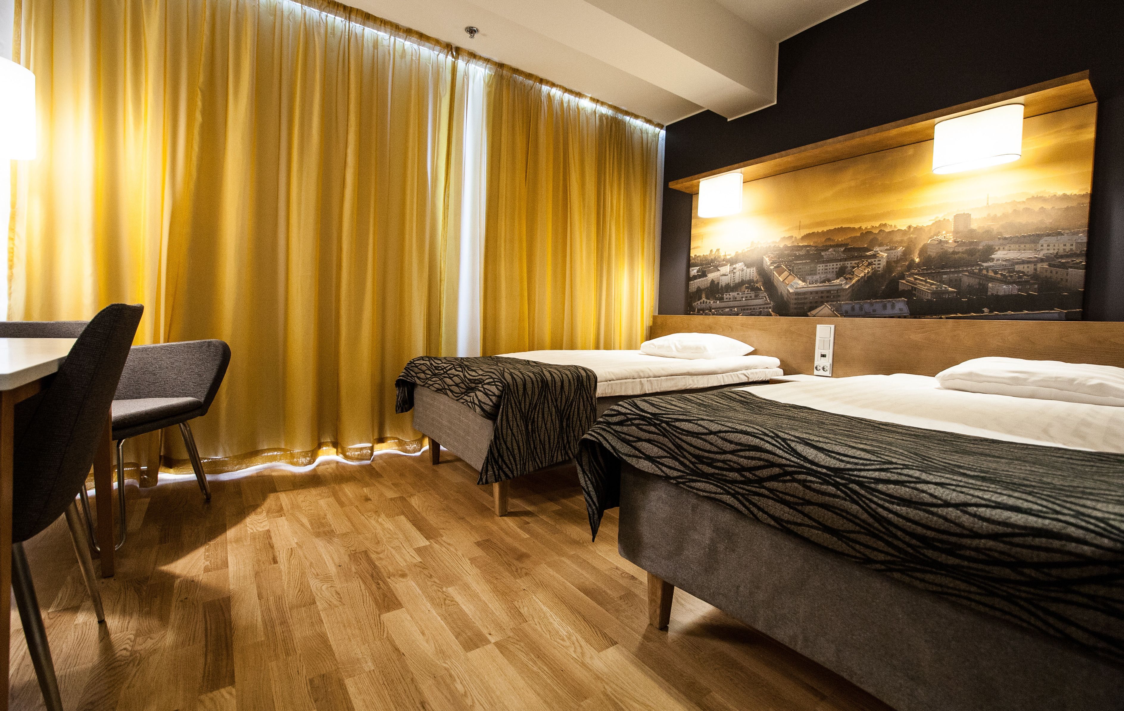 twin room | minibar, in-room safe, desk, iron/ironing board