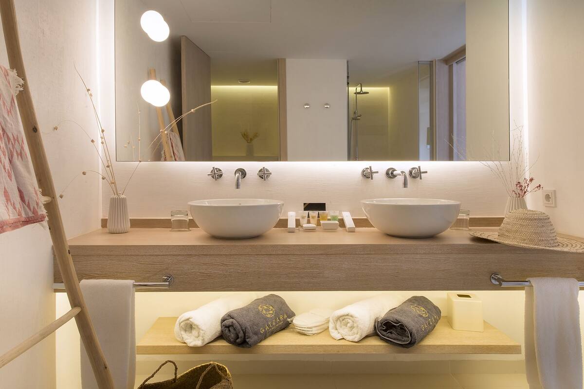 suite, resort view | bathroom | free toiletries, hair dryer, bathrobes, slippers