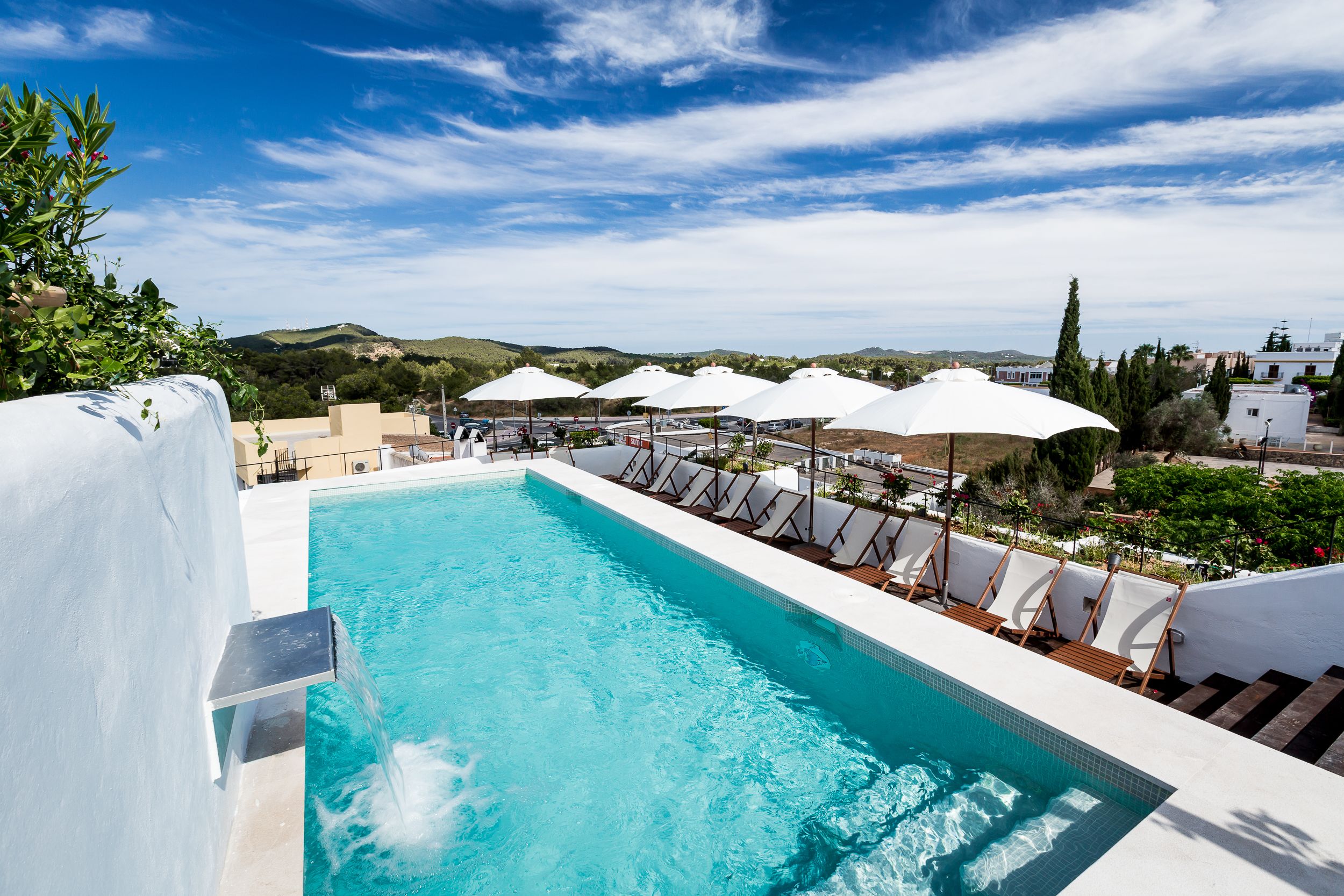 seasonal outdoor pool, pool umbrellas, pool loungers