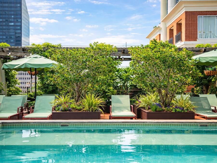Outdoor pool, open 11:00 AM to 7:00 PM, sun loungers
