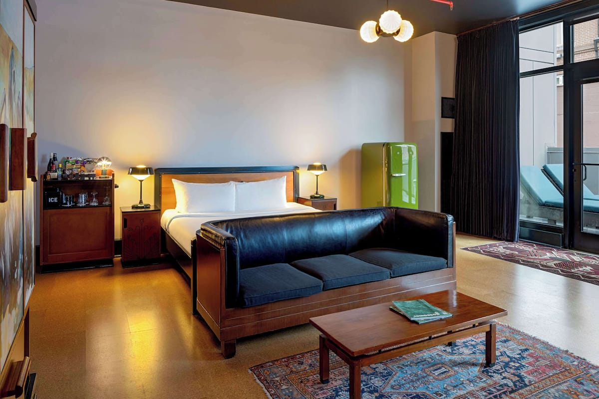 Suite, 1 chambre, patio | Draps en coton égyptien, literie de qualité supérieure, minibar