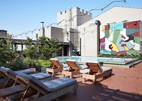 Outdoor pool, open 11:00 AM to 7:00 PM, sun loungers