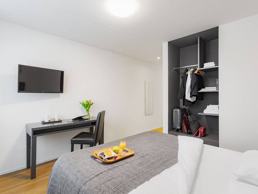 Chambre double | Fer et planche à repasser, accès au Wi-Fi (inclus), literie fournie