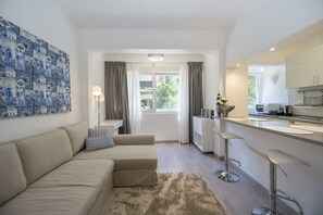 Departamento Deluxe, 1 habitación | Sala de estar
