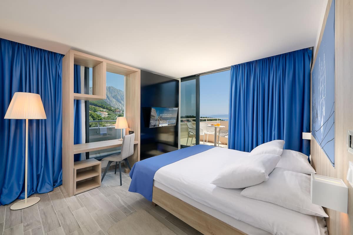 superior suite, balcony, sea view | 1 bedroom, premium bedding, minibar, in-room safe