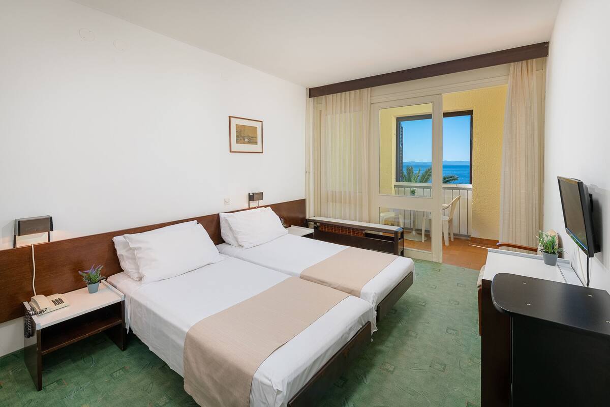 Double or Twin Room, Balcony, Sea View | In-room safe, desk, cribs (surcharge), rollaway beds (surcharge)