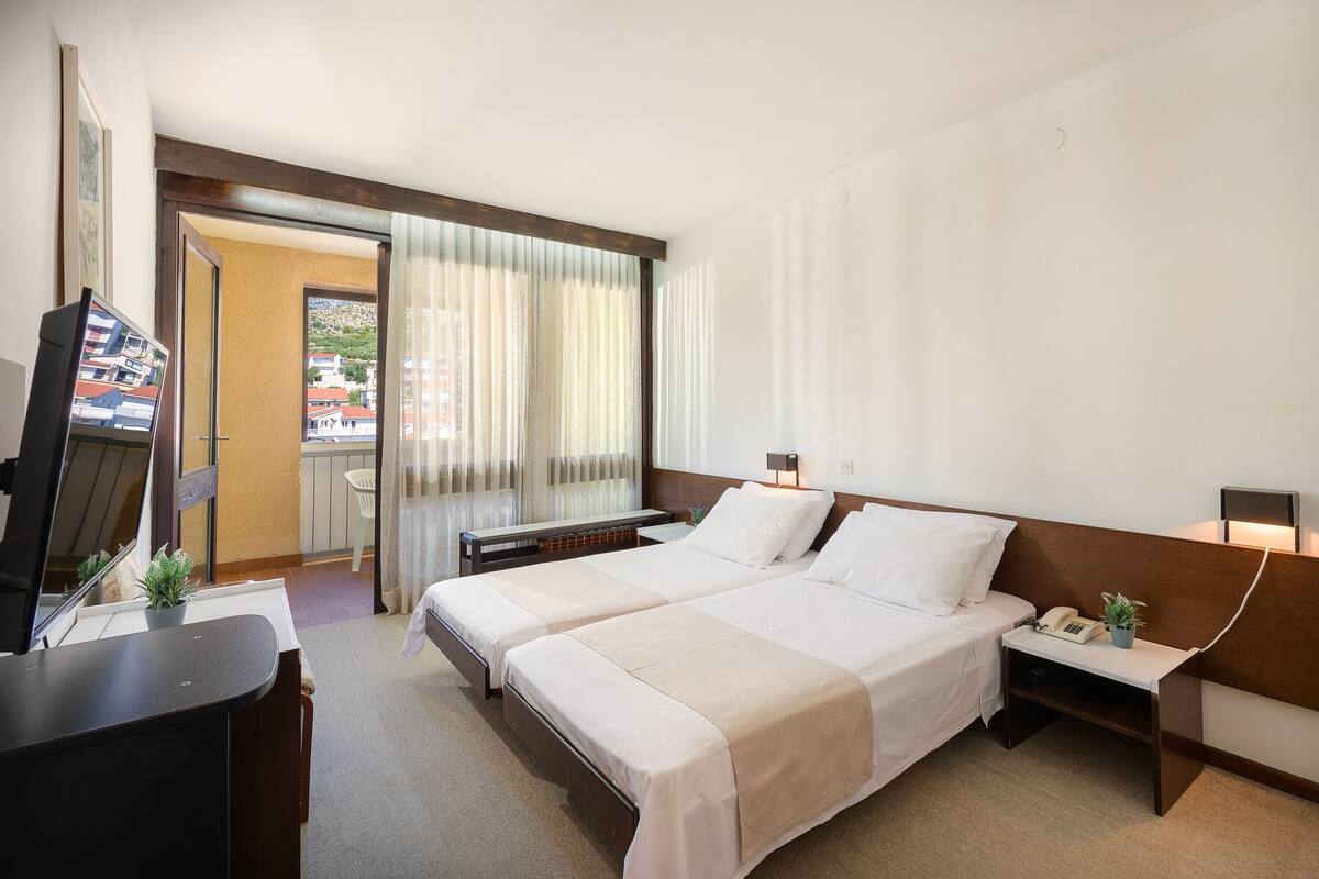 Standard Double or Twin Room | In-room safe, desk, cribs (surcharge), rollaway beds (surcharge)