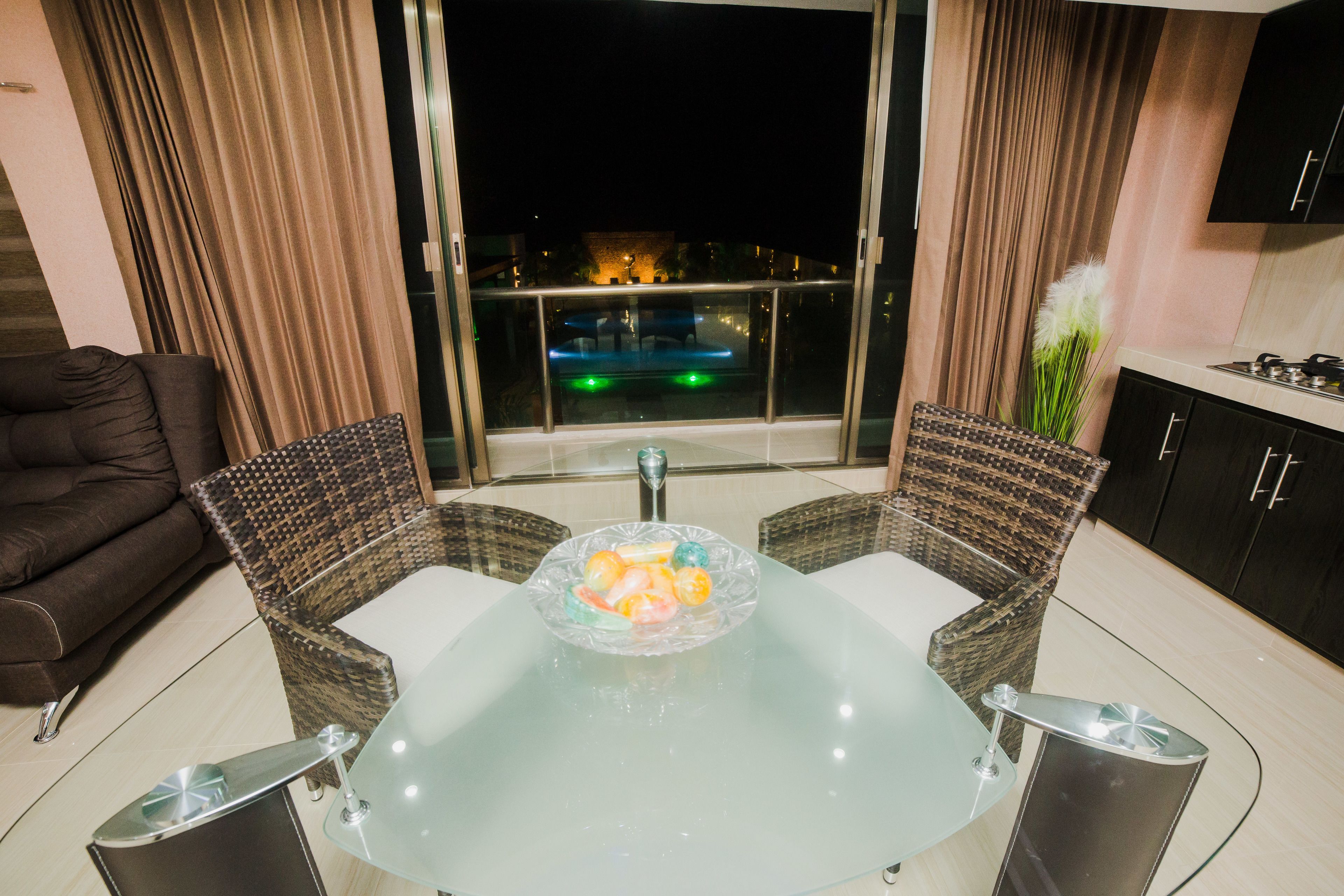 Full-sized fridge, microwave, stovetop, cookware/dishes/utensils