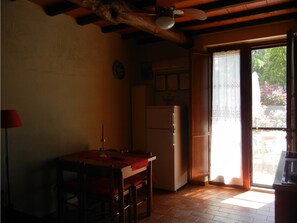 Family Apartment, 1 Bedroom, Kitchenette, Garden Area | Living area | 23-inch flat-screen TV with digital channels, TV