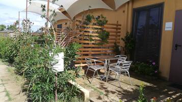 Triple Room, 1 Bedroom, Poolside | Terrace/patio