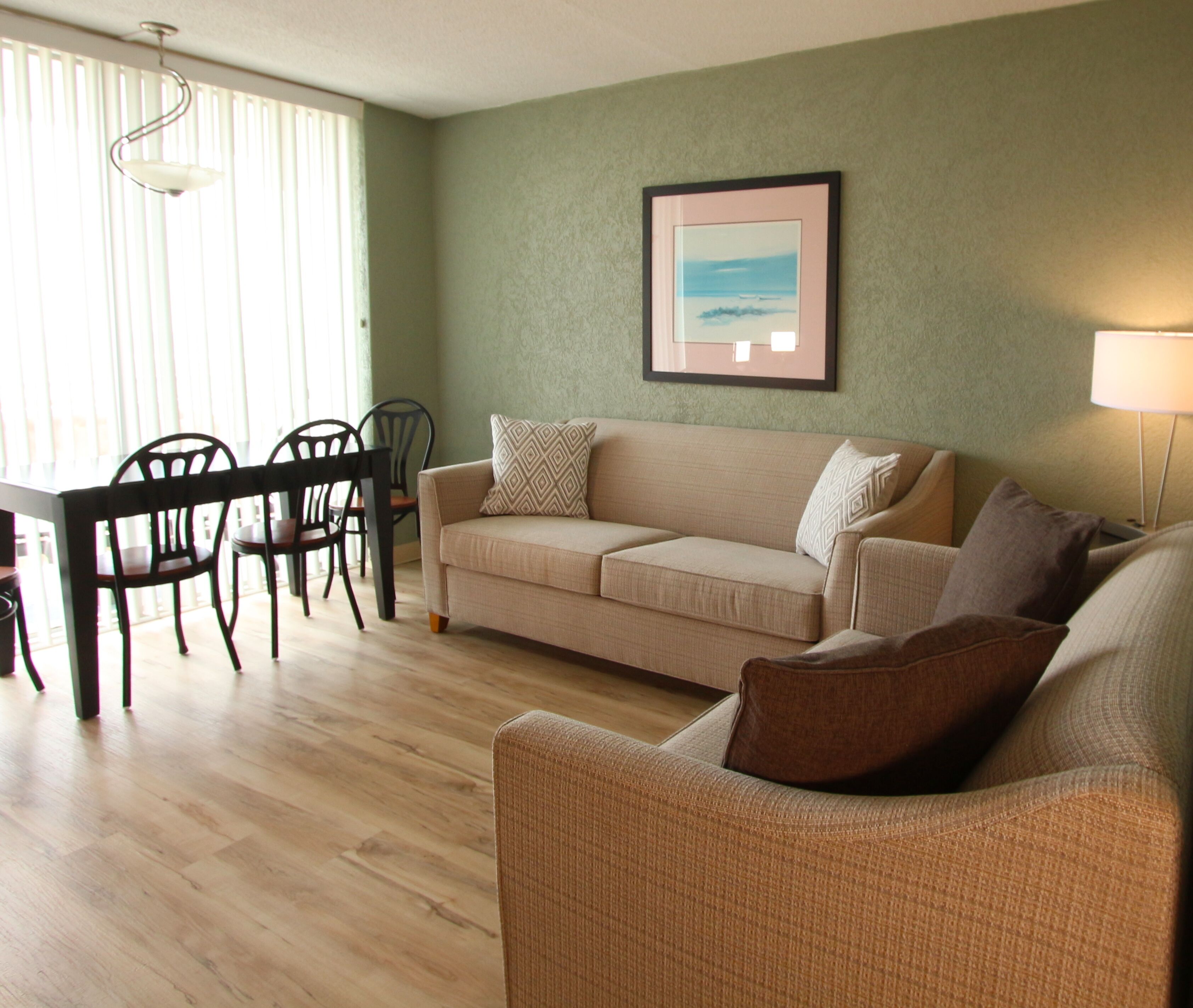 oceanfront 1 bedroom non-efficiency suite | living area | tv