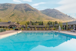 Outdoor pool, open 8:00 AM to 10:00 PM, sun loungers