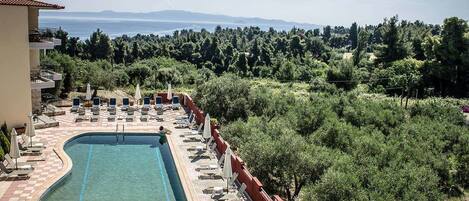 Outdoor pool, pool umbrellas, pool loungers