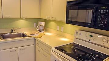 Full-size fridge, microwave, stovetop