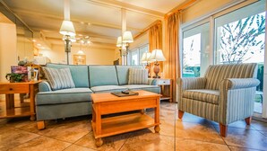 Condo, 1 Bedroom, Pool View | Living room - Coral Reef Beach Resort (St. Pete Beach)