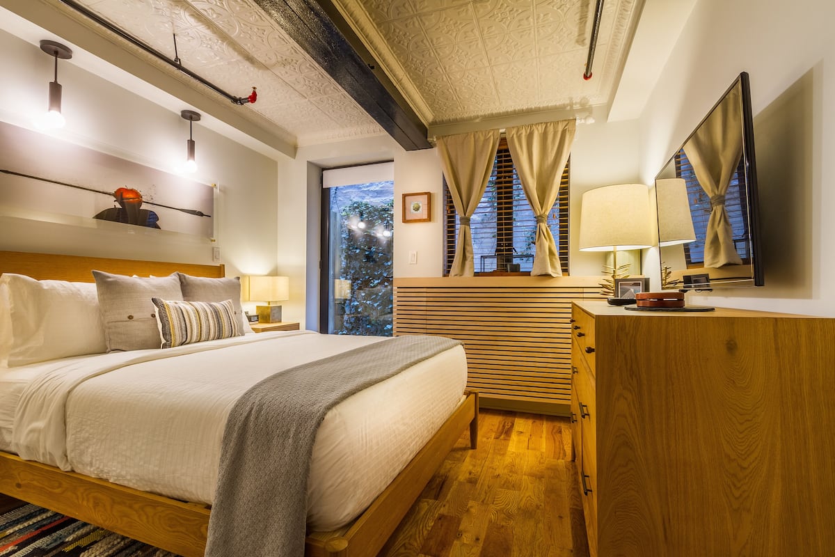 deluxe loft suite with patio (lower level) | 1 bedroom, premium bedding, memory-foam beds, in-room safe