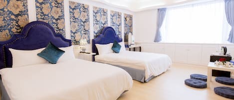 Deluxe Quadruple Room | 1 bedroom, Frette Italian sheets, premium bedding, down comforters