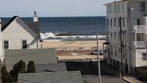 A coastal building with a view of the ocean. - The Ocean Plaza (Ocean Grove)