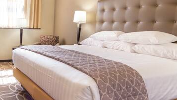 Laptop workspace, blackout drapes, iron/ironing board