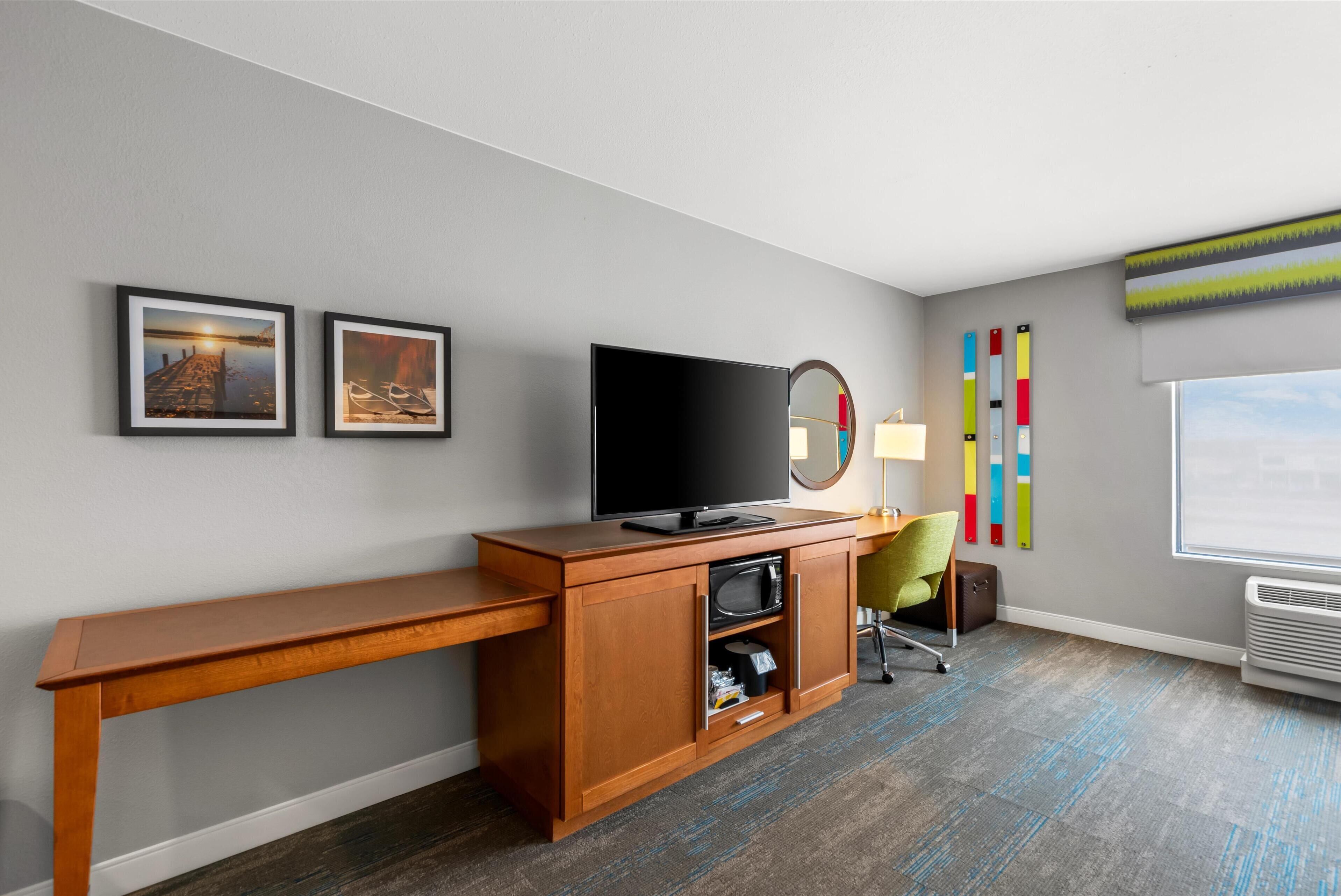 room, 1 king bed, non smoking, refrigerator & microwave | in-room safe, desk, cots/infant beds, free wifi