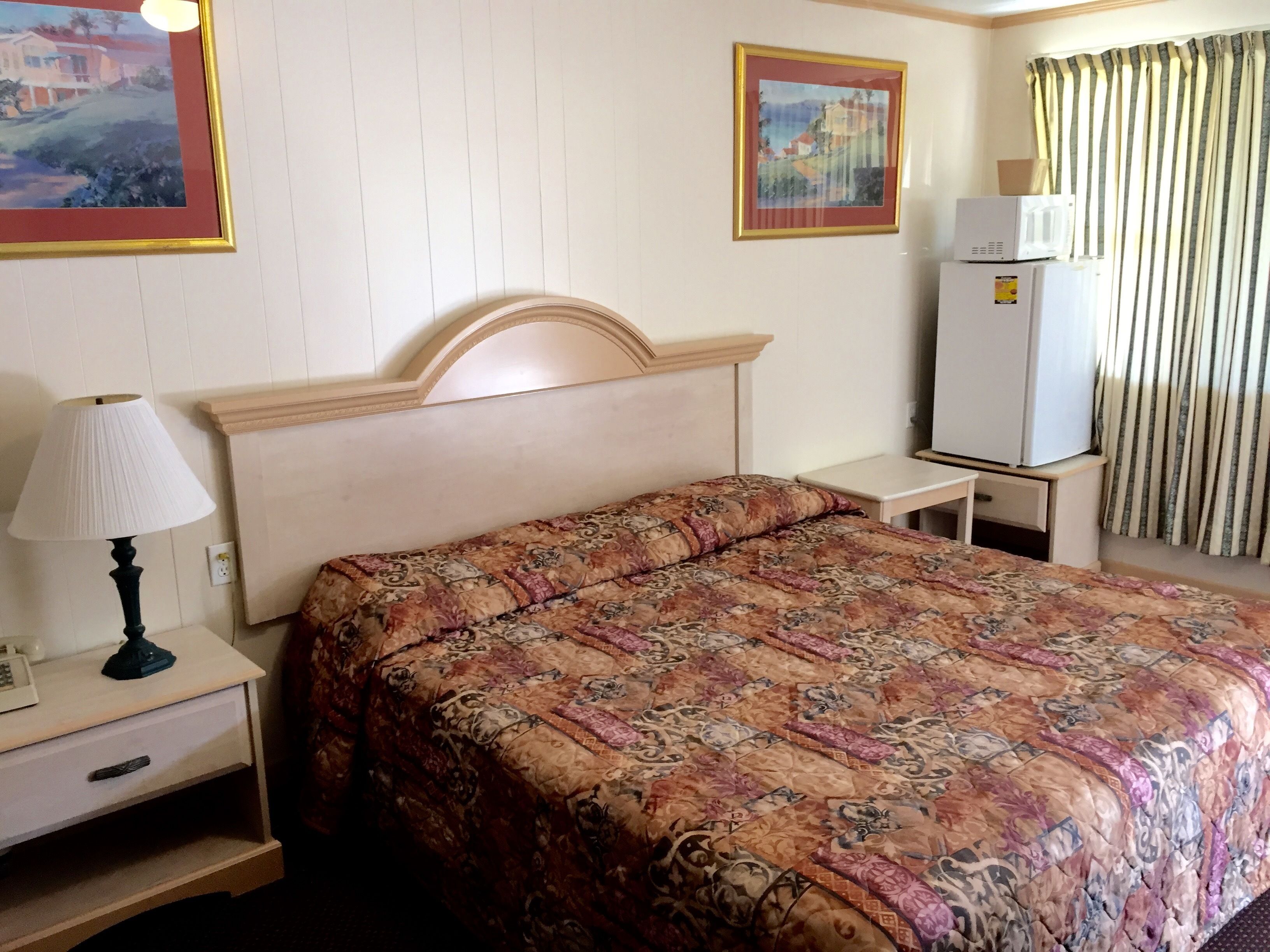 Room, 2 Queen Beds | Iron/ironing board, free WiFi, bed sheets