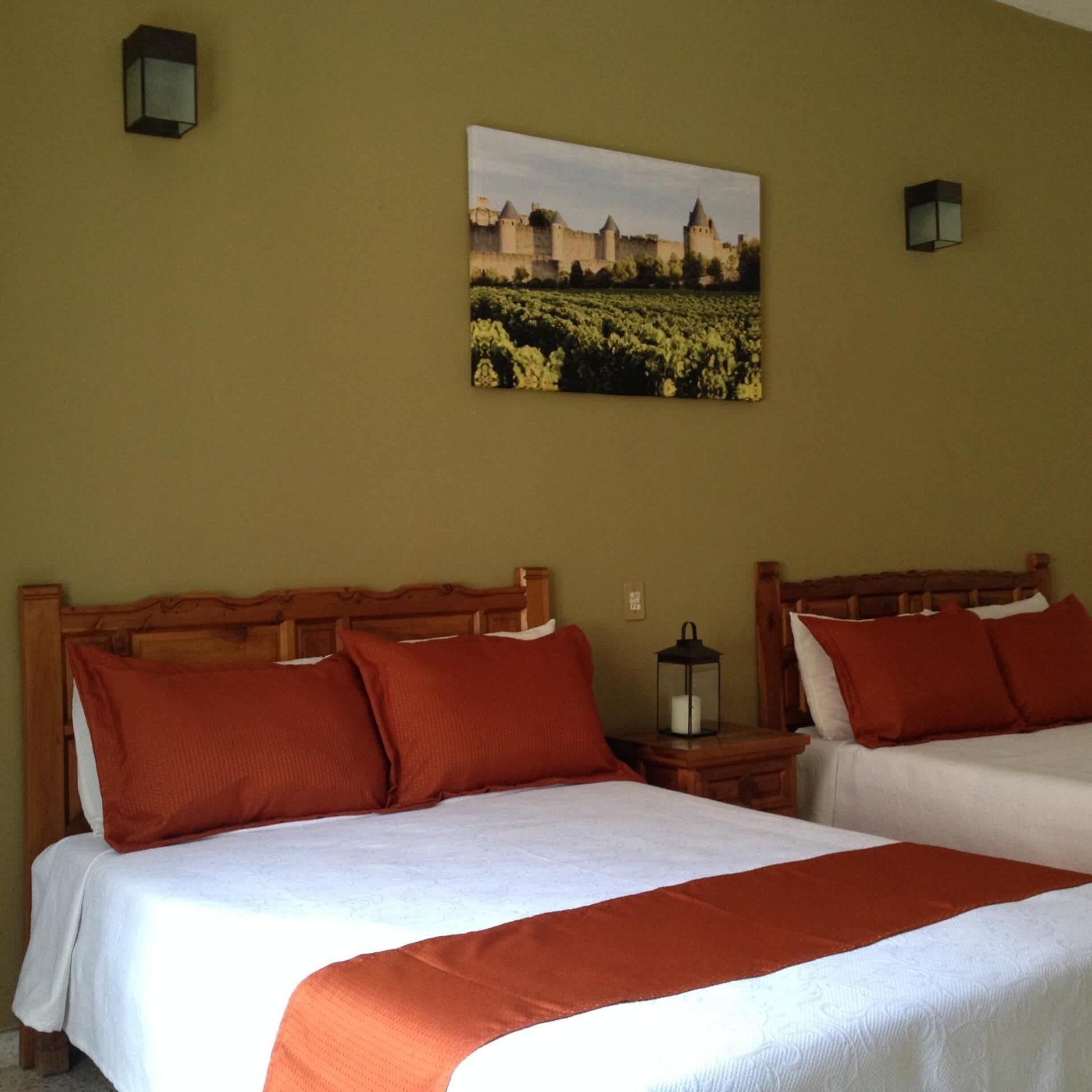 Desk, iron/ironing board, bed sheets