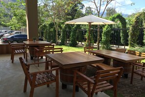 Lunch, dinner, brunch served; international cuisine, garden views 