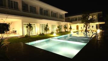 Outdoor pool, pool umbrellas, pool loungers
