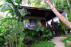 A small, single-story building with a porch and a staircase leading to the entrance. - KiriRaya (Krabi)