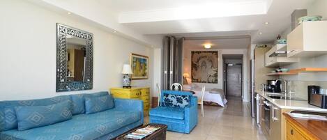 Exclusive Apartment, 1 Room, Canal View | Living area | Flat-screen TV, DVD player