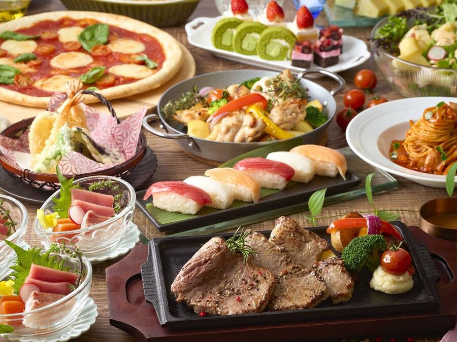 A variety of dishes including sushi, steak, and a pizza.