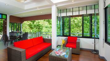 Luxury Room, Kitchenette, Sea View | Living area | 32-inch flat-screen TV with satellite channels, TV