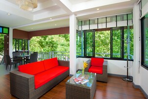 Luxury Room, Kitchenette, Sea View | Living area | 32-inch flat-screen TV with satellite channels, TV
