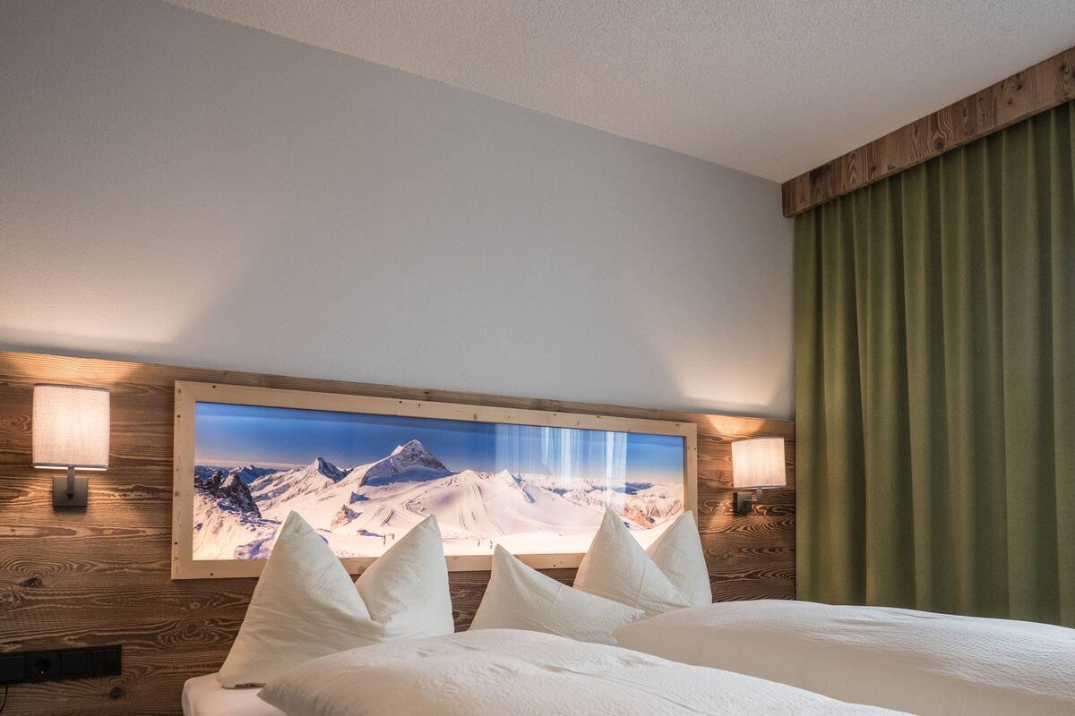 premium bedding, down duvets, pillow-top beds, in-room safe