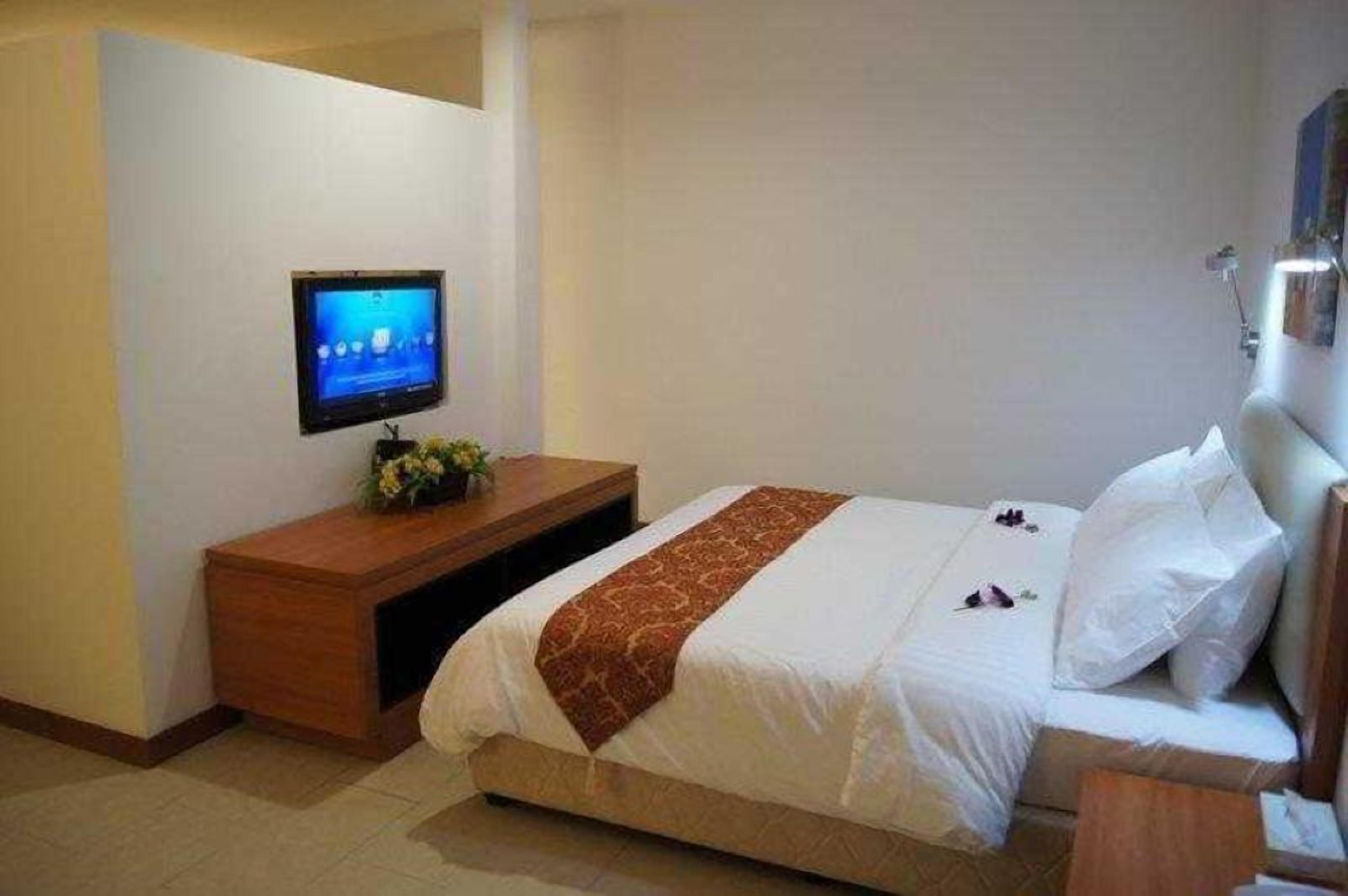 deluxe room | in-room safe, desk, laptop workspace, iron/ironing board