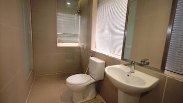 Shower, free toiletries, slippers, towels
