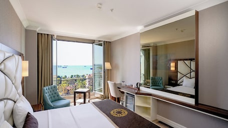 Premium bedding, free minibar, in-room safe, desk. The Grand Mira Hotel