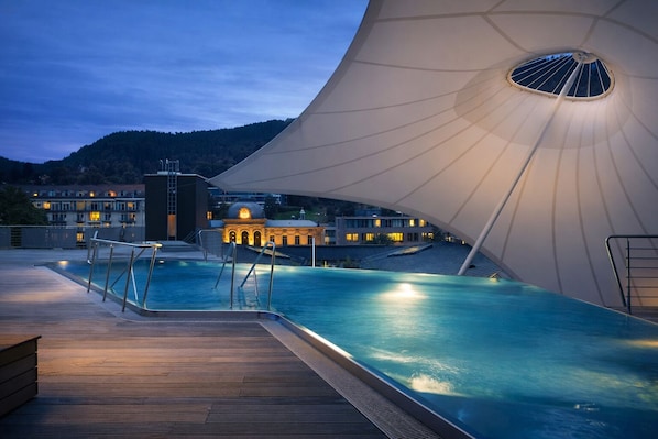 10 indoor pools, outdoor pool, open 8:00 AM to 9:30 PM, pool umbrellas