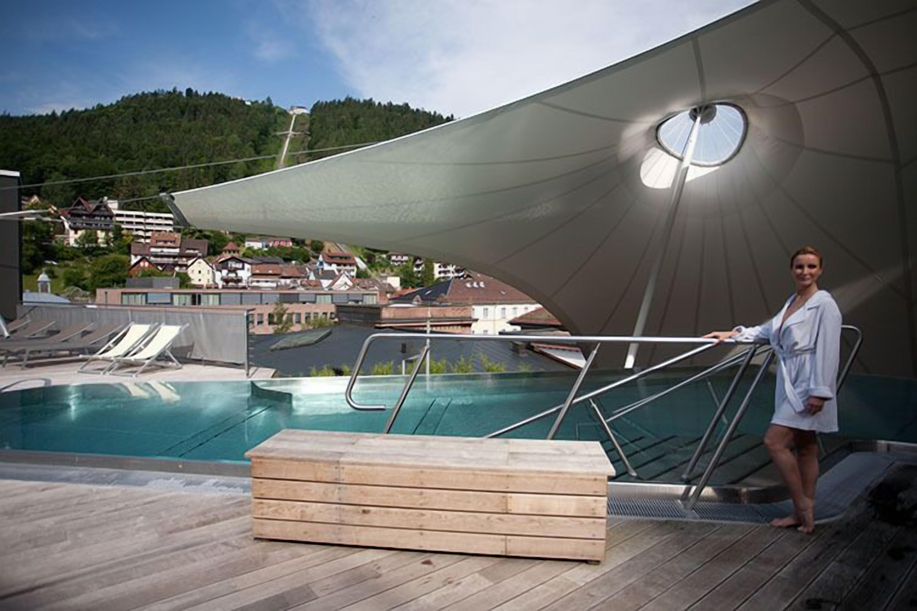 10 indoor pools, outdoor pool, open 8:00 AM to 9:30 PM, pool umbrellas