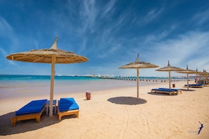 Private beach, sun loungers, beach umbrellas, beach towels