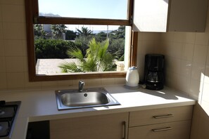 Appartement Standard, 2 chambres | Coin séjour | Télévision de 37 cm avec chaînes par satellite