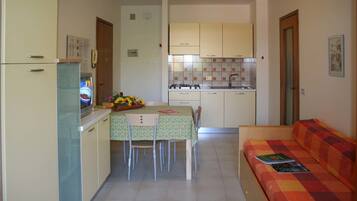 Apartment, 1 Bedroom | Living area | TV