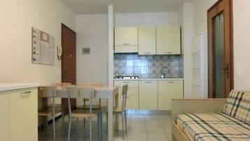 Apartment, 1 Bedroom | Living area | TV