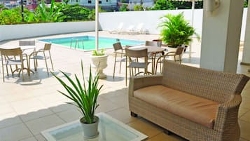 Outdoor pool, open 9 AM to 10 PM, sun loungers
